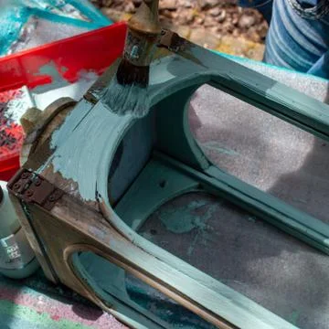 Painting the side of a lantern-2 Stock Photos