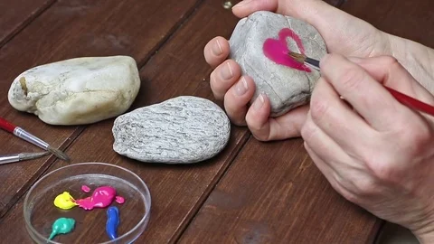 Painting on stone Video stock 71027952