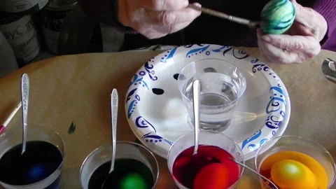 Painting Stripes On An Easter Egg Stock Footage 150269458