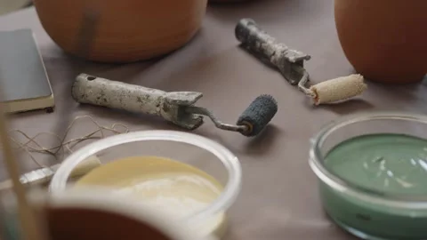 Painting tools on a table in a ceramics workshop Stock Footage 321314103