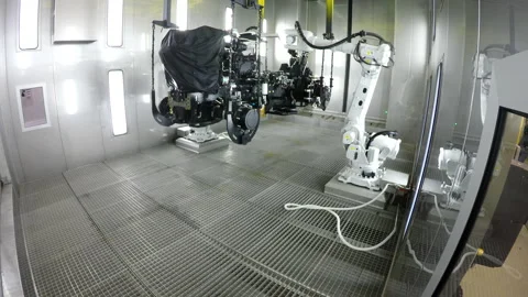 Painting Vehicle Frame Robots From The Spray In The Production Of Cars Stock Footage 148320165