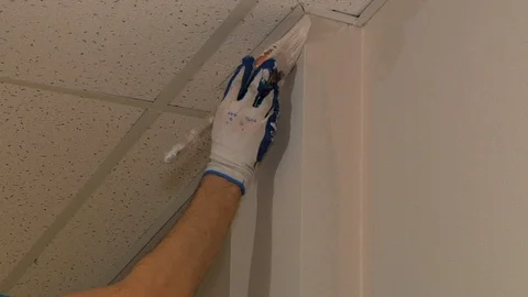 Painting the wall with a paintbrush 스톡 동영상 111497462