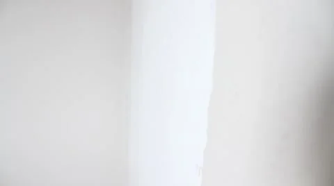 Painting a wall with a roller Stock-Footage 43963935