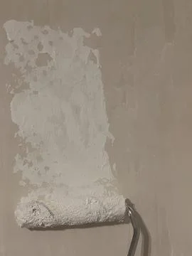 Painting Wall with Roller – Work in Progress Stock Photos