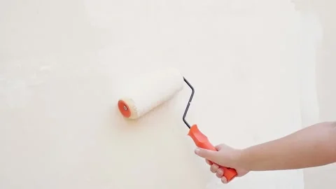 Painting the wall on white  Stock Footage 154336681