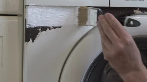 Painting a washing machine from rust Vídeos de archivo 339270723
