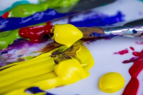 Paints and brushes Stock Photos