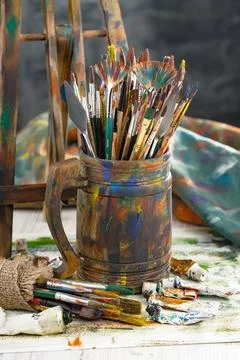 Paints and brushes Stock Photos