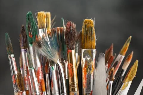 Paints and brushes Stock Photos