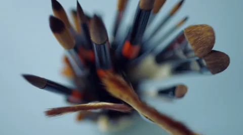 Paints and brushes on the table Stock Footage 47750720