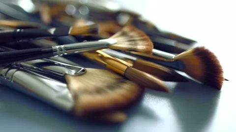 Paints and brushes on the table Stockbeeldmateriaal 47751104