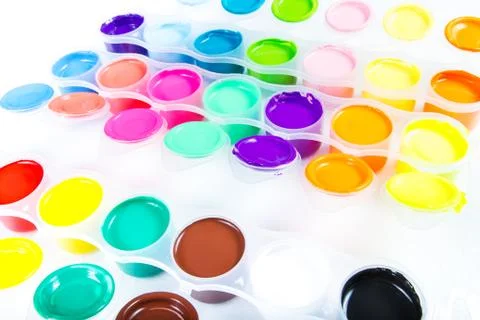 Paints into containers . Stock Photos