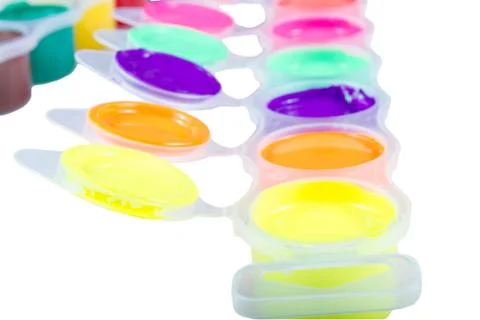 Paints into containers . Stock Photos