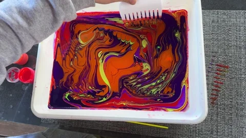 Paints on the water in the ebru technique. The concept of children's creativity Stock Footage 277609084