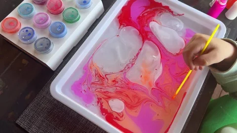 Paints on the water in the ebru technique. Stock Footage 277608856