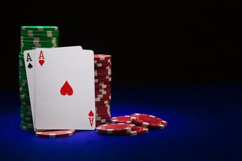 Pair of aces on stuck of chips Stock Photos