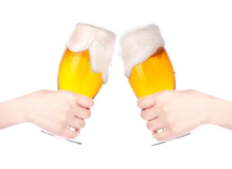 Pair of beer glasses with hand making a toast isolated Stock Photos