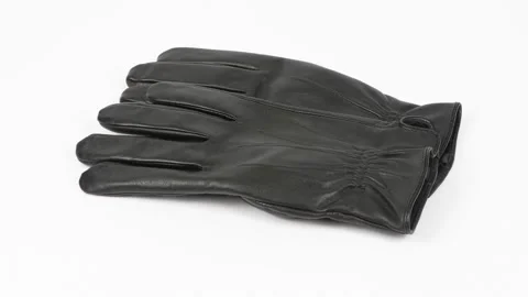 Pair black of leather gloves isolated on white. Side view. Stock Footage 168480732