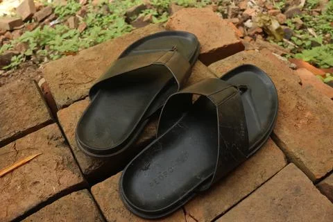 A Pair of Black Sandals Stock Photos