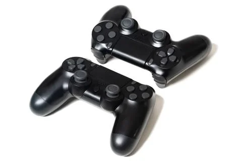 Pair of black video game controllers Stock Photos