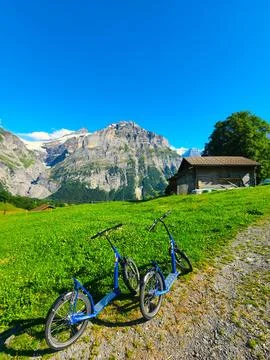 A pair of blue bicycles Stock Photos