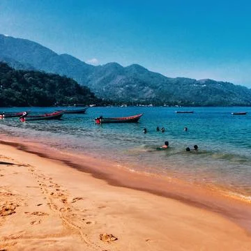 Pair of boats on the beach Stock Photos