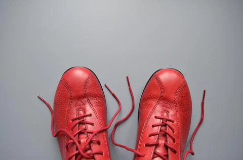 Pair of boots with untied laces Stock Photos