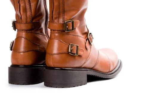Pair of brown boots Stock Photos
