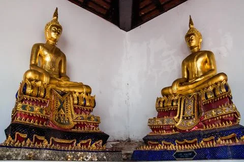 Pair of buddha statues Stock Photos