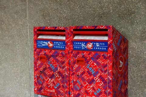 Pair of Canada Post mailboxes with postal code wrap Stock-Fotos