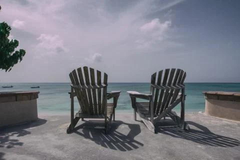 Pair of chairs on the beach Fotos de archivo