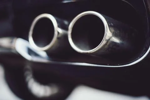 Pair of circular metal objects attached to binoculars Stock Photos