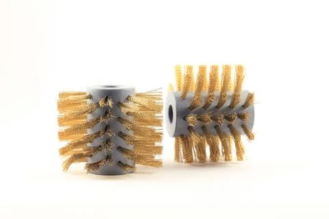 Pair of circular wire brushes on side Stock Photos