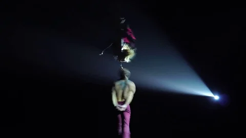A pair of circus dancing acrobats performing in the air. Stock Footage 85124546