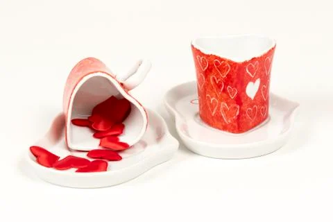 Pair of coffee cups surrounded by red hearts. Concept of valentine. Foto stock