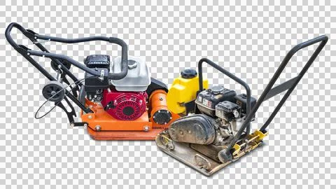 A pair of compacting machines designed for soil compaction, positioned next.. Foto stock