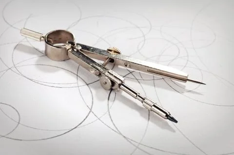 Pair of compasses drawing Stock Photos