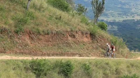 A pair of cyclist riding together . Stock Footage 22245169