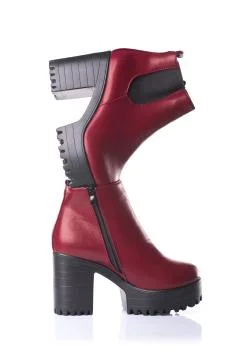 Pair of dark red ankle boots Stock-Fotos
