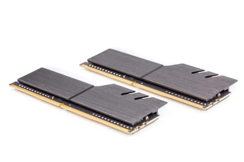 A pair of ddr4 dimm pc ram memoty modules with stylish black heatsinks - Stock Photos
