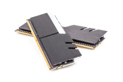 A pair of ddr4 dimm pc ram memoty modules with stylish black heatsinks - Stock Photos