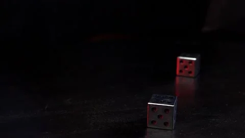 A pair of dice rolling in slow motion Stock Footage 144036384