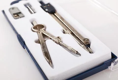 Pair of drawing compasses set Stock Photos