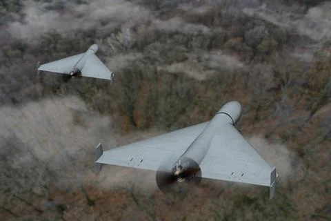 A pair of drones in action - attack drones over dense forest. 写真素材