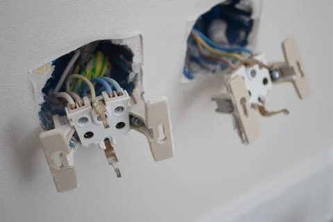 Pair of electrical socket on the wall Stock Photos