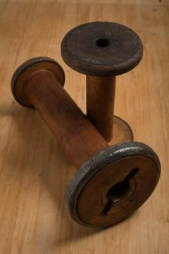 A Pair of Empty Old Thread Spools Stock Photos