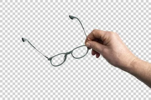 A pair of eyeglasses in hand Stock Photos