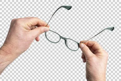A pair of eyeglasses in hand Stock Photos