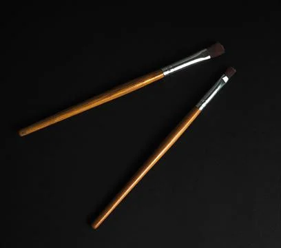 Pair fine tip makeup brushes Stock Photos