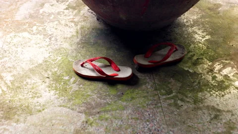 Pair Of Flip-flops On The Floor In Mysterious Abandoned Hotel Pondok Indah Stock Footage 267951700